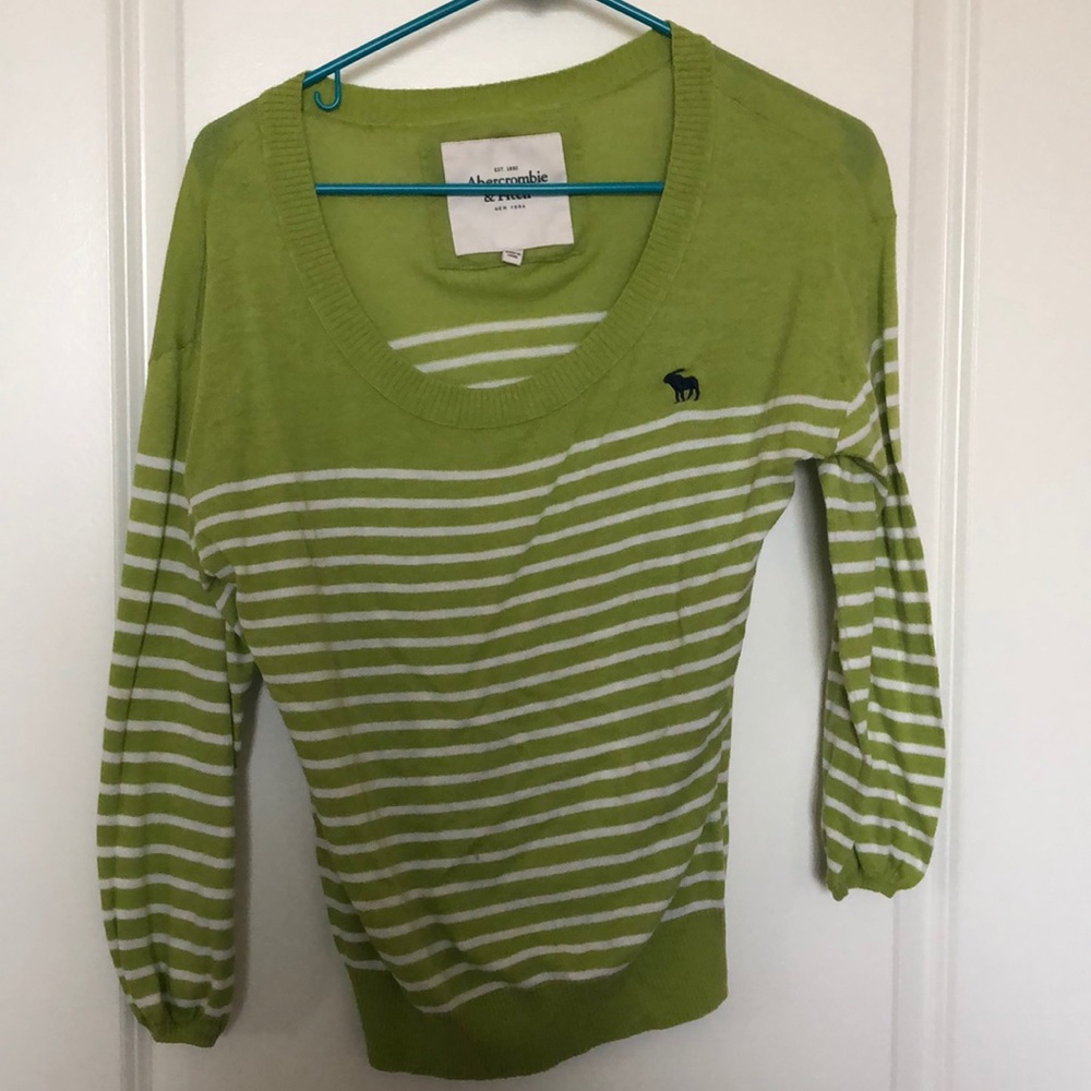 Green and white striped sweater